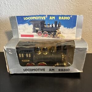 vintage "Iron Horse" novelty AM transistor radio shaped like a steam locomotive